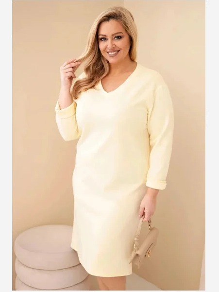 Dámska plus size sukňa maslová s výstrihom V a rukávom žltá