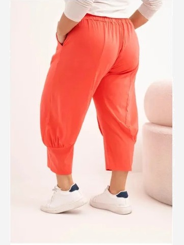 Dámske nohavice Plus Size s nízkym krokom a gumou v páse koralové