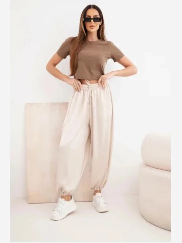 Dámske široké nohavice s gumou v páse a viazaním v štýle aladínok béžové