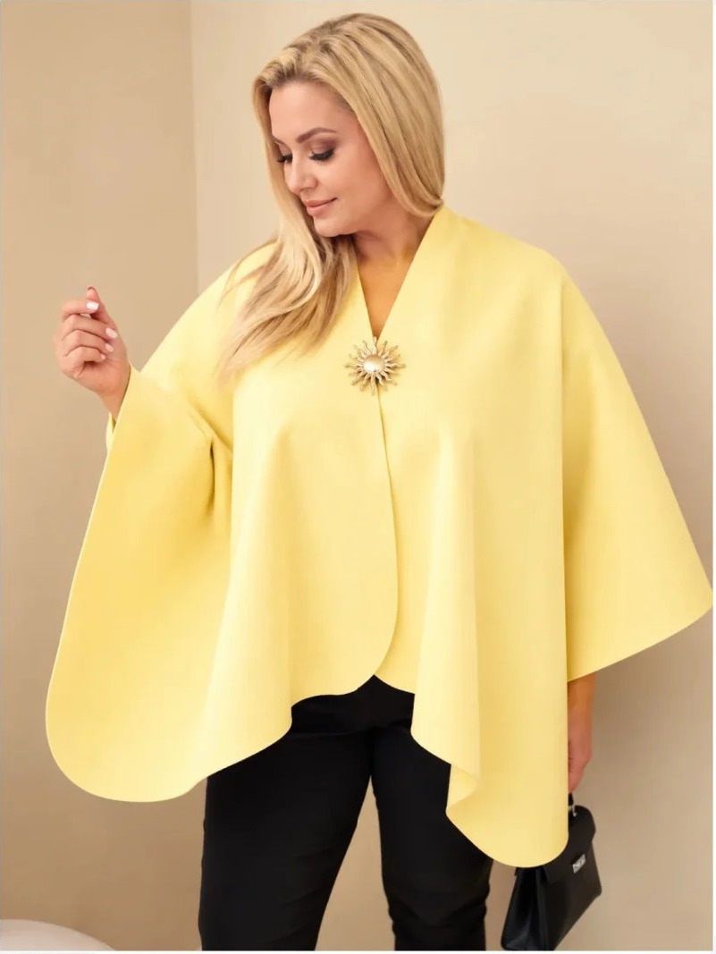 Dámske pončo plus size s brošňou žltá